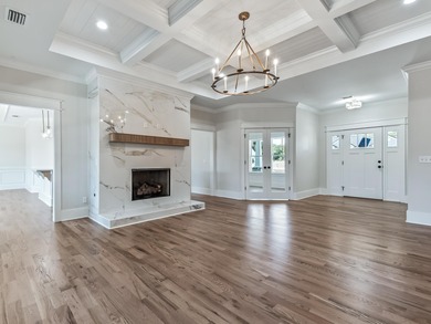 Move-in Ready! Exquisite new construction overlooking hole 6 of on Wildwood Country Club in Florida - for sale on GolfHomes.com, golf home, golf lot