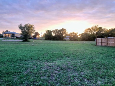 Undeveloped 50'x150' Lot Next to Stocked Pond Located in a Gated on Links At Lands End in Texas - for sale on GolfHomes.com, golf home, golf lot