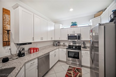 This almost new villa is located in the popular gated community on Sabal Trace Golf and Country Club in Florida - for sale on GolfHomes.com, golf home, golf lot