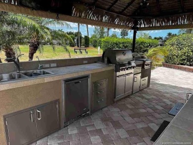 This meticulous 2528 square foot lot offers a unique opportunity on Motorcoach Resort Golf Course in Florida - for sale on GolfHomes.com, golf home, golf lot