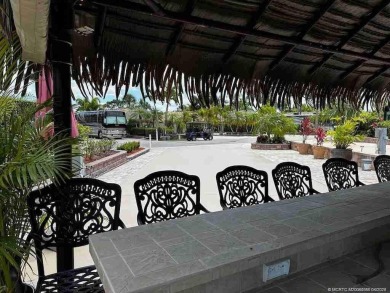 This meticulous 2528 square foot lot offers a unique opportunity on Motorcoach Resort Golf Course in Florida - for sale on GolfHomes.com, golf home, golf lot