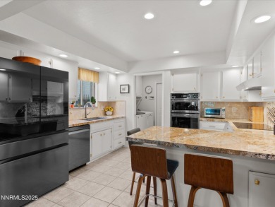 Discover the perfect blend of elegance, comfort, and natural on LakeRidge Golf Course in Nevada - for sale on GolfHomes.com, golf home, golf lot