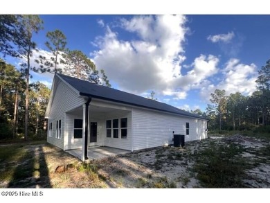 Great deal on nearly complete new construction on the golf on The Lakes Country Club in North Carolina - for sale on GolfHomes.com, golf home, golf lot