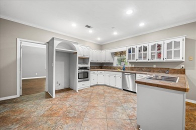 This spacious 3-bedroom, 2-bathroom home offers an idyllic on Laurel Country Club in Mississippi - for sale on GolfHomes.com, golf home, golf lot