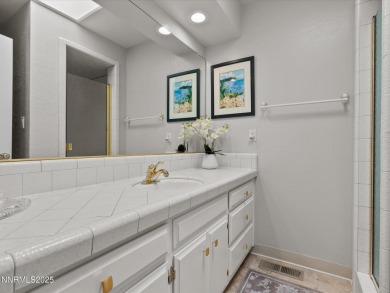 Discover the perfect blend of elegance, comfort, and natural on LakeRidge Golf Course in Nevada - for sale on GolfHomes.com, golf home, golf lot
