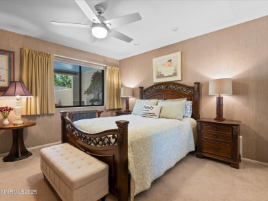 Discover the perfect blend of elegance, comfort, and natural on LakeRidge Golf Course in Nevada - for sale on GolfHomes.com, golf home, golf lot