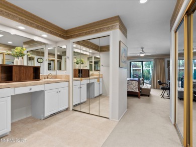 Discover the perfect blend of elegance, comfort, and natural on LakeRidge Golf Course in Nevada - for sale on GolfHomes.com, golf home, golf lot