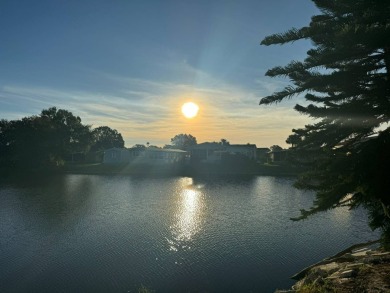 Awe inspiring views of the water and florida wildlife await you on Golden Lakes Golf Course in Florida - for sale on GolfHomes.com, golf home, golf lot