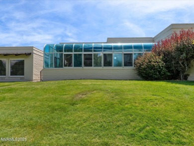 Discover the perfect blend of elegance, comfort, and natural on LakeRidge Golf Course in Nevada - for sale on GolfHomes.com, golf home, golf lot