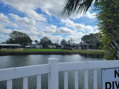 Awe inspiring views of the water and florida wildlife await you on Golden Lakes Golf Course in Florida - for sale on GolfHomes.com, golf home, golf lot