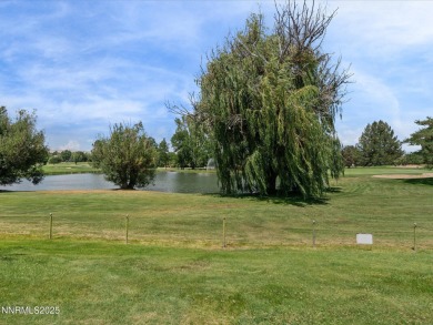 Discover the perfect blend of elegance, comfort, and natural on LakeRidge Golf Course in Nevada - for sale on GolfHomes.com, golf home, golf lot