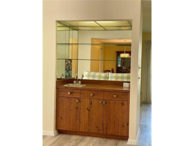 This 2/2 plus den with a 1 car garage is set on a peaceful lake on Martin Downs Country Club in Florida - for sale on GolfHomes.com, golf home, golf lot