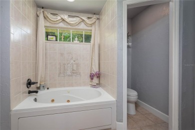 WATERFRONT HOME on CANAL TO BEAUTIFUL LAKE JUNE-- A Pool home on Placid Lakes Country Club in Florida - for sale on GolfHomes.com, golf home, golf lot