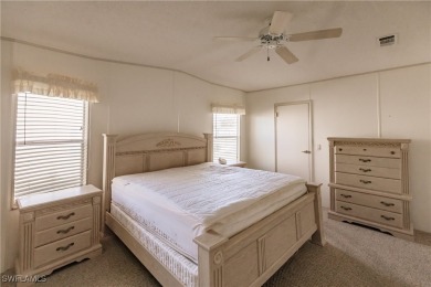 This lovely 2 bedroom/2 bath home has a split bedroom floor plan on Pine Lakes Country Club in Florida - for sale on GolfHomes.com, golf home, golf lot