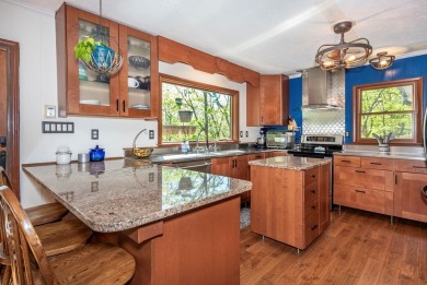 Tucked away on 1.14 acre lot, this ranch-style mountain home on Bent Tree Golf Course in Georgia - for sale on GolfHomes.com, golf home, golf lot