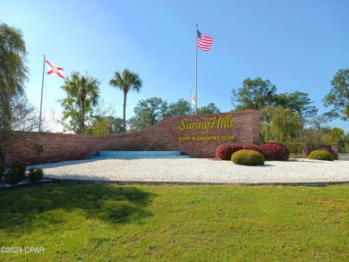 As one of the original sturdy concrete block homes that was on Sunny Hills Golf and Country Club in Florida - for sale on GolfHomes.com, golf home, golf lot