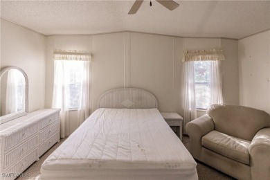 This lovely 2 bedroom/2 bath home has a split bedroom floor plan on Pine Lakes Country Club in Florida - for sale on GolfHomes.com, golf home, golf lot