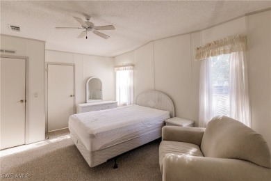 This lovely 2 bedroom/2 bath home has a split bedroom floor plan on Pine Lakes Country Club in Florida - for sale on GolfHomes.com, golf home, golf lot