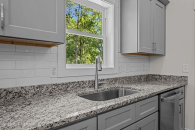 Welcome to this thoughtfully crafted Southport Floor Plan with a on Harbour Point Golf Club in North Carolina - for sale on GolfHomes.com, golf home, golf lot