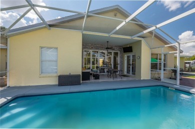 WATERFRONT HOME on CANAL TO BEAUTIFUL LAKE JUNE-- A Pool home on Placid Lakes Country Club in Florida - for sale on GolfHomes.com, golf home, golf lot