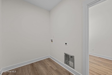 Welcome to this thoughtfully crafted Southport Floor Plan with a on Harbour Point Golf Club in North Carolina - for sale on GolfHomes.com, golf home, golf lot