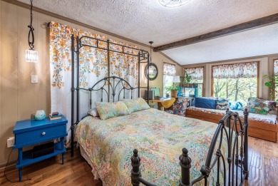Tucked away on 1.14 acre lot, this ranch-style mountain home on Bent Tree Golf Course in Georgia - for sale on GolfHomes.com, golf home, golf lot