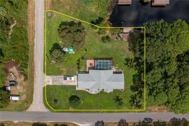 WATERFRONT HOME on CANAL TO BEAUTIFUL LAKE JUNE-- A Pool home on Placid Lakes Country Club in Florida - for sale on GolfHomes.com, golf home, golf lot