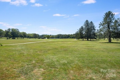 Located in Etowah, this 1.5 story 2 bedroom, 2 bath end unit on Etowah Valley Golf Club in North Carolina - for sale on GolfHomes.com, golf home, golf lot