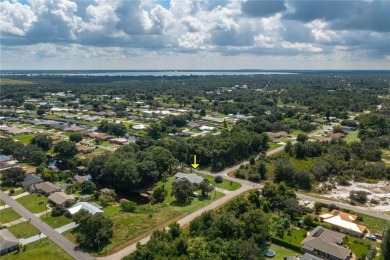 WATERFRONT HOME on CANAL TO BEAUTIFUL LAKE JUNE-- A Pool home on Placid Lakes Country Club in Florida - for sale on GolfHomes.com, golf home, golf lot