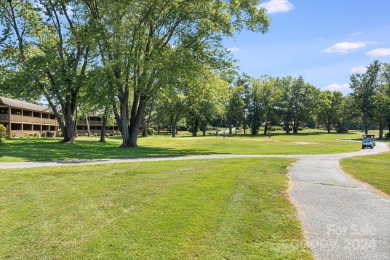 Located in Etowah, this 1.5 story 2 bedroom, 2 bath end unit on Etowah Valley Golf Club in North Carolina - for sale on GolfHomes.com, golf home, golf lot