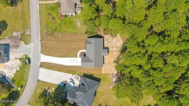 Welcome to this thoughtfully crafted Southport Floor Plan with a on Harbour Point Golf Club in North Carolina - for sale on GolfHomes.com, golf home, golf lot
