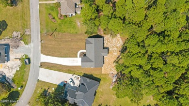 Welcome to this thoughtfully designed Southport Floor Plan with on Harbour Point Golf Club in North Carolina - for sale on GolfHomes.com, golf home, golf lot
