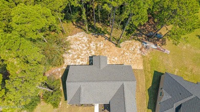 Welcome to this thoughtfully designed Southport Floor Plan with on Harbour Point Golf Club in North Carolina - for sale on GolfHomes.com, golf home, golf lot