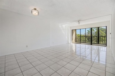 Nestled in the serene and popular Cove Cay Village IV, this on Cove Cay Country Club in Florida - for sale on GolfHomes.com, golf home, golf lot