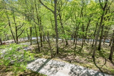 Tucked away on 1.14 acre lot, this ranch-style mountain home on Bent Tree Golf Course in Georgia - for sale on GolfHomes.com, golf home, golf lot
