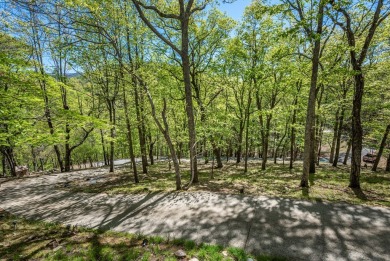 Tucked away on 1.14 acre lot, this ranch-style mountain home on Bent Tree Golf Course in Georgia - for sale on GolfHomes.com, golf home, golf lot