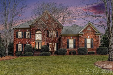 Welcome to this beautifully updated 4-bedroom, 3.5-bath home on TPC at Piper Glen in North Carolina - for sale on GolfHomes.com, golf home, golf lot