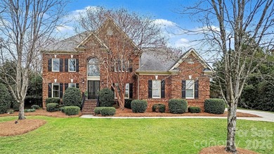 Welcome to this beautifully updated 4-bedroom, 3.5-bath home on TPC at Piper Glen in North Carolina - for sale on GolfHomes.com, golf home, golf lot