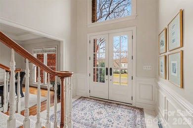 Welcome to this beautifully updated 4-bedroom, 3.5-bath home on TPC at Piper Glen in North Carolina - for sale on GolfHomes.com, golf home, golf lot