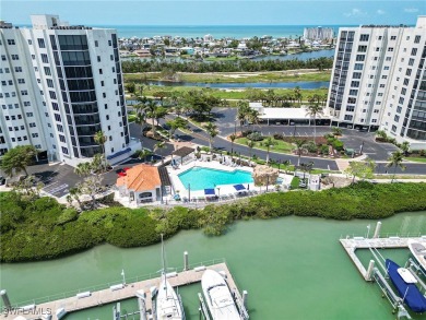 Experience bayfront living in this 6th-floor residence at on Fort Myers Beach and Golf Club in Florida - for sale on GolfHomes.com, golf home, golf lot