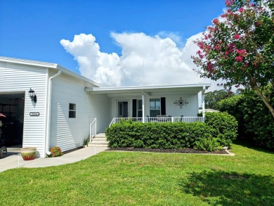 A RARE OPPORTUNITY TO FIND THIS MODEL AT THIS PRICE.  OWNERS ARE on Southport Springs Golf Club in Florida - for sale on GolfHomes.com, golf home, golf lot