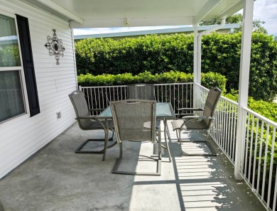 A RARE OPPORTUNITY TO FIND THIS MODEL AT THIS PRICE.  OWNERS ARE on Southport Springs Golf Club in Florida - for sale on GolfHomes.com, golf home, golf lot