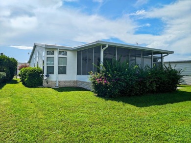 A RARE OPPORTUNITY TO FIND THIS MODEL AT THIS PRICE.  OWNERS ARE on Southport Springs Golf Club in Florida - for sale on GolfHomes.com, golf home, golf lot