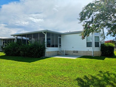 A RARE OPPORTUNITY TO FIND THIS MODEL AT THIS PRICE.  OWNERS ARE on Southport Springs Golf Club in Florida - for sale on GolfHomes.com, golf home, golf lot