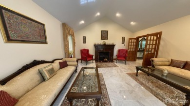 This executive home features 6750 sq. ft. Conveniently located on Marquette Golf Club in Michigan - for sale on GolfHomes.com, golf home, golf lot