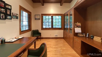 This executive home features 6750 sq. ft. Conveniently located on Marquette Golf Club in Michigan - for sale on GolfHomes.com, golf home, golf lot