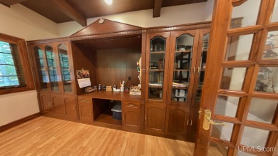 This executive home features 6750 sq. ft. Conveniently located on Marquette Golf Club in Michigan - for sale on GolfHomes.com, golf home, golf lot