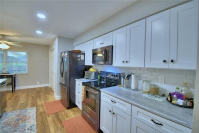 Welcome to this beautiful 2 bedroom/2 bath home. Enjoy cooking on Cypresswood Golf and Country Club in Florida - for sale on GolfHomes.com, golf home, golf lot