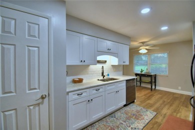Welcome to this beautiful 2 bedroom/2 bath home. Enjoy cooking on Cypresswood Golf and Country Club in Florida - for sale on GolfHomes.com, golf home, golf lot
