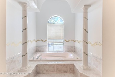 Welcome to 4371 Hunters Pass in the sought-after gated golf on Silverthorn Country Club in Florida - for sale on GolfHomes.com, golf home, golf lot
